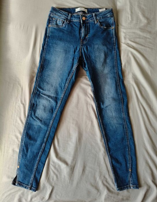 Niebieskie jeansy Reserved, r. 36