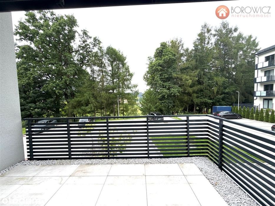 Kawalerka z dużym tarasem, komórką i m. parking