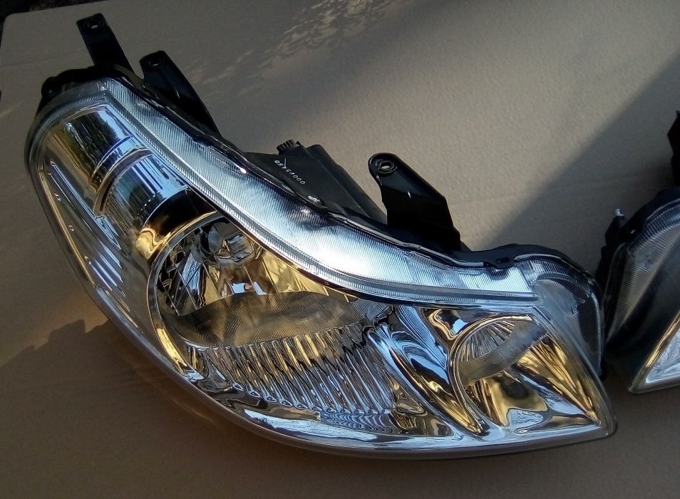 SUZUKI SX4 2006 -lampa przednia lewa + prawa komplet