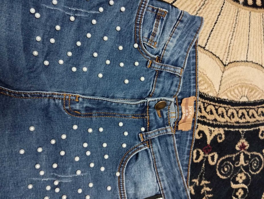 Spodnie jeans damskie