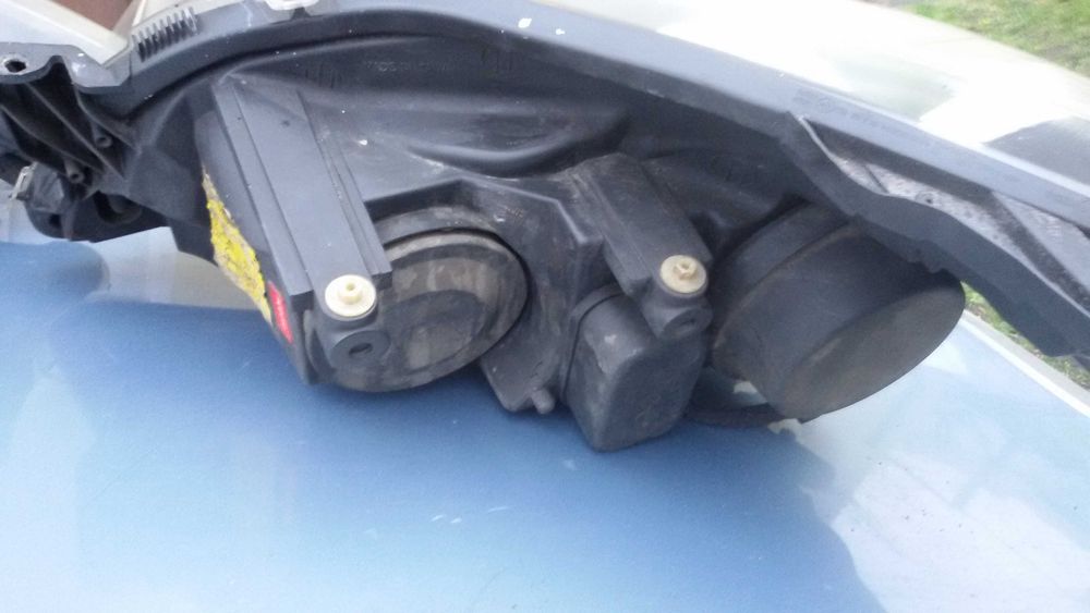 Lampy przednie Opel Astra H