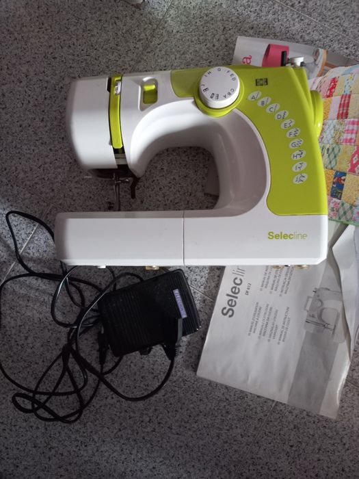 maquina de costura elétrica