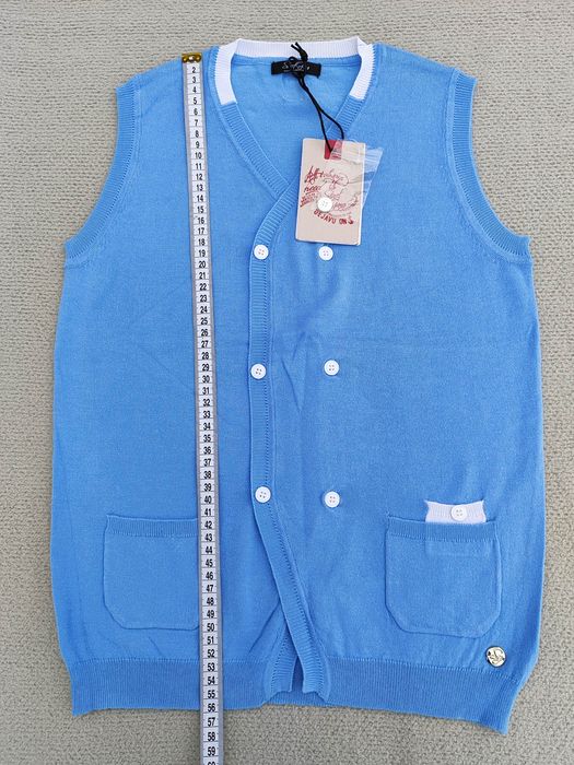 Жилетки на підлітків, гортайте фото