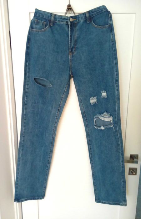 Новые джинсы с дырками