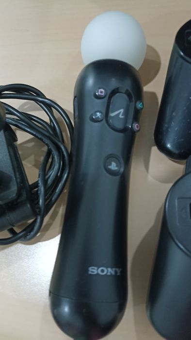 PlayStation3 com comandos e câmara
