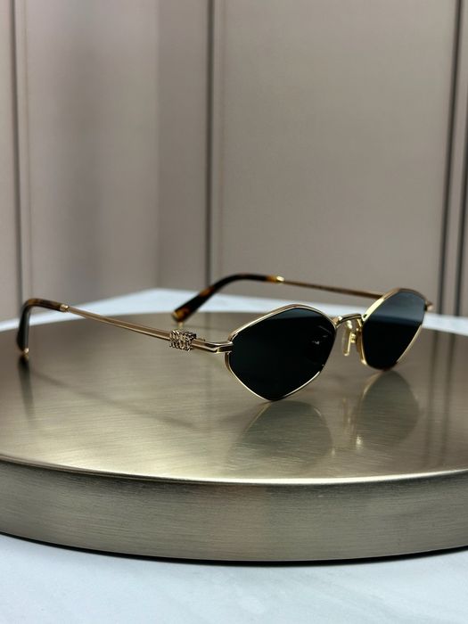 Сонцезахисні окуляри Miu Miu SMU 56Z золоті ромбоподібні металеві жіночі оригінал