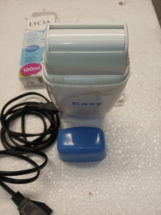 Maquina de depilação a cera