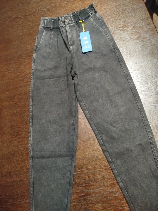 Жіночі джинси 26 р
