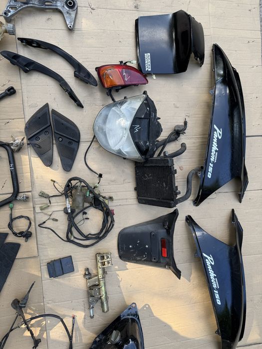 Honda Pantheon 150 owiewka lampa czujnik kiwak instalacja uchwyt wąż