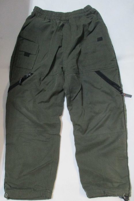 Spodnie ocieplane polarem zielone 134-140 używane
