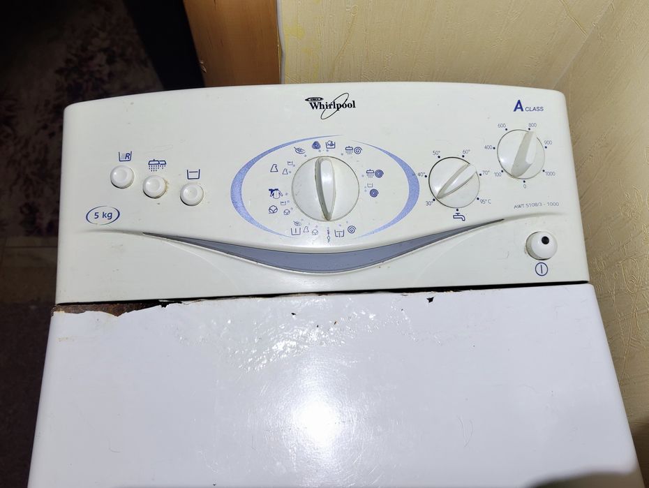 Стиральная машинка Whirpool,вертикальная загрузка 5 кг.