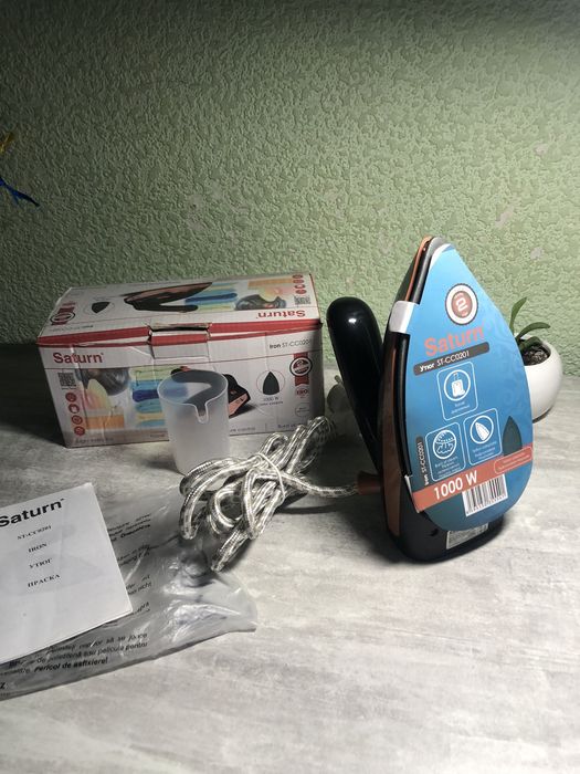 Дорожня праска Нова Saturn ST-CC0201: 800 грн. - Праски Горішні