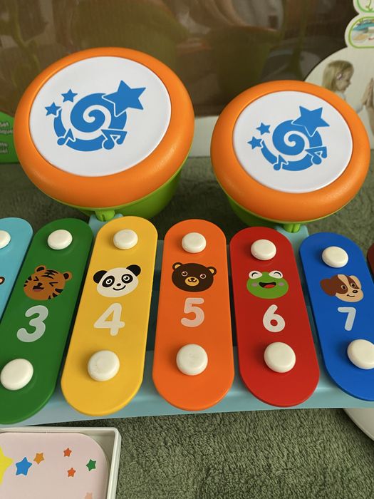 Ксилофон з барабанами дзвіночком нотами музикальна іграшка