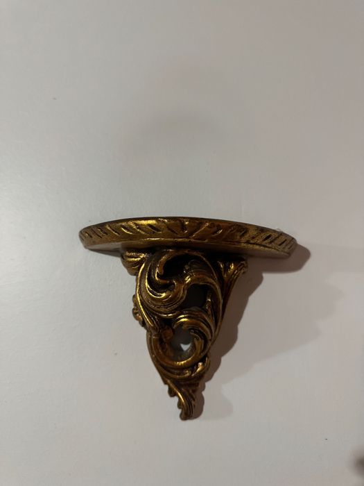 Conjunto de duas peanhas em talha dourada