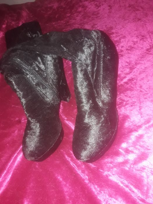 Botas  altas acima joelho