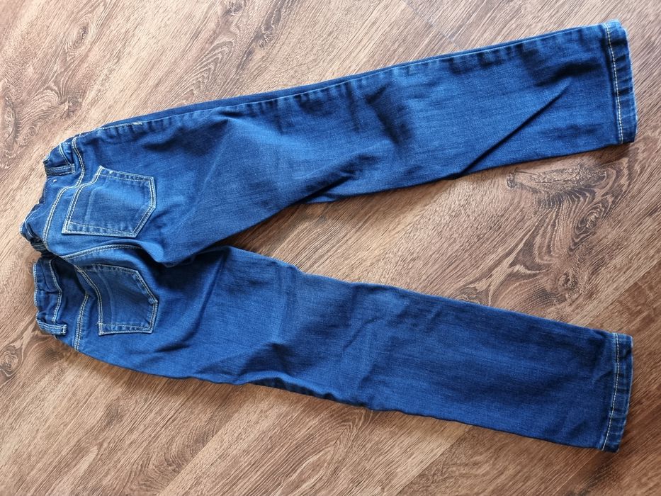 Spodnie jeans 128