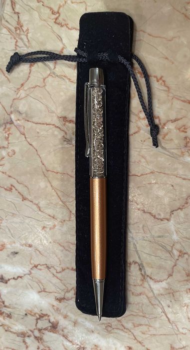 Caneta Swarowski dourada e com cristais dourados