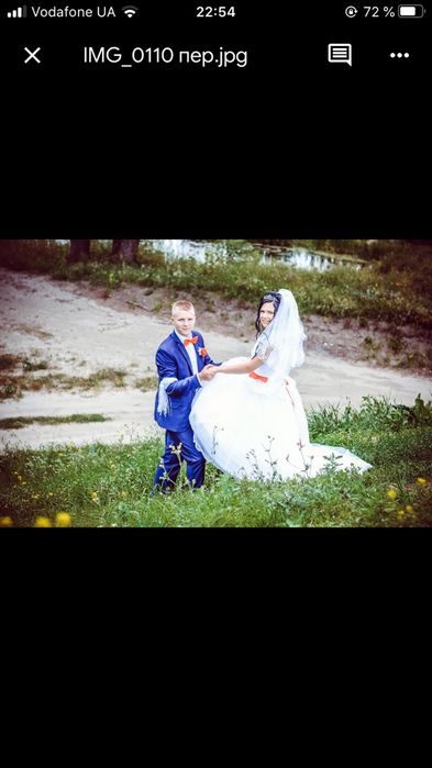 Весільна сукня з червоним бантом червоний стиль