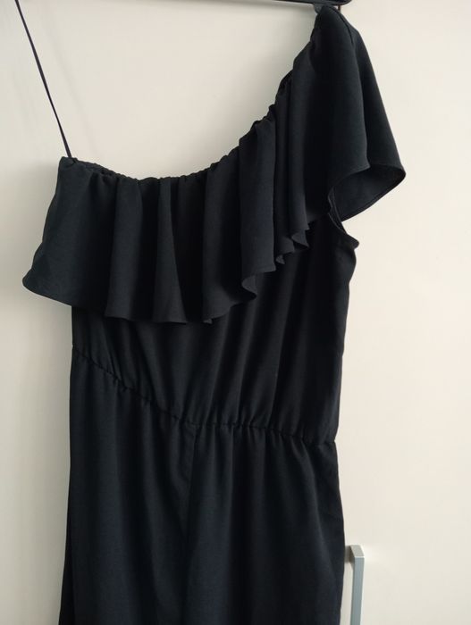 Śliczny kombinezon HM roz.XS.Polecam.