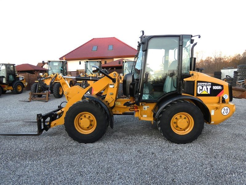 Caterpillar CAT 906H2 Z Niemiec / Ładny Stan / 5.958mtg / kilka sztuk /  907 908 / Duży wybór ładowarek / miniładowarek / 506 507 / 406 407
