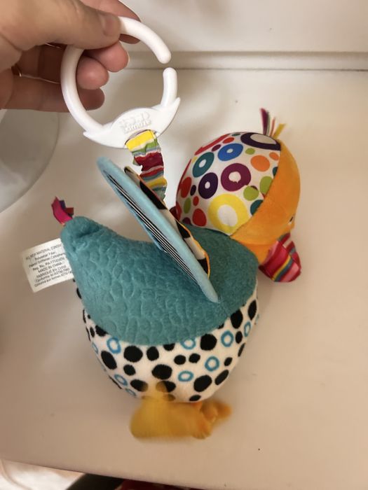 Іграшка на коляску