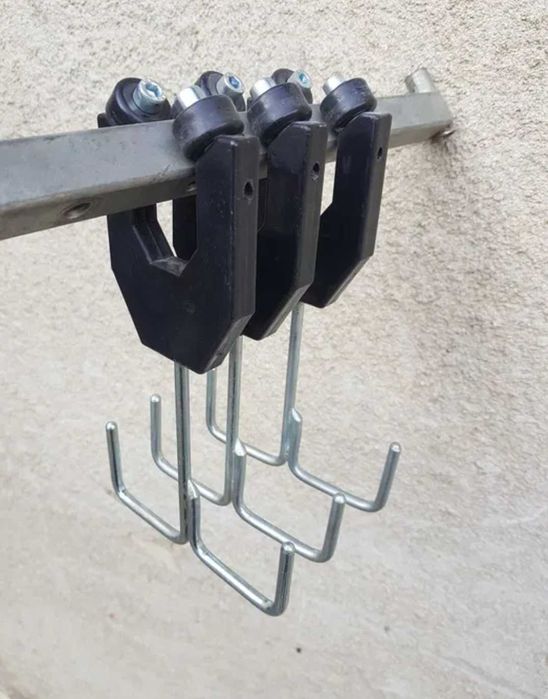 Вешалка на роликах , вешалки на роликах вішаки передвижные крючки