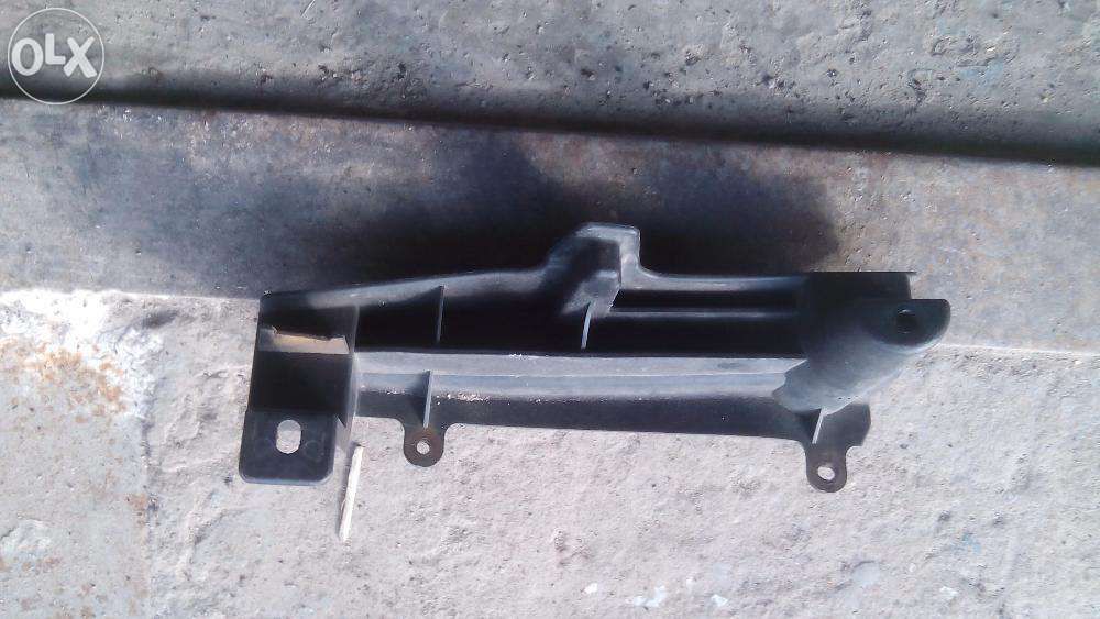 Кронштейн крепления переднего бампера левый