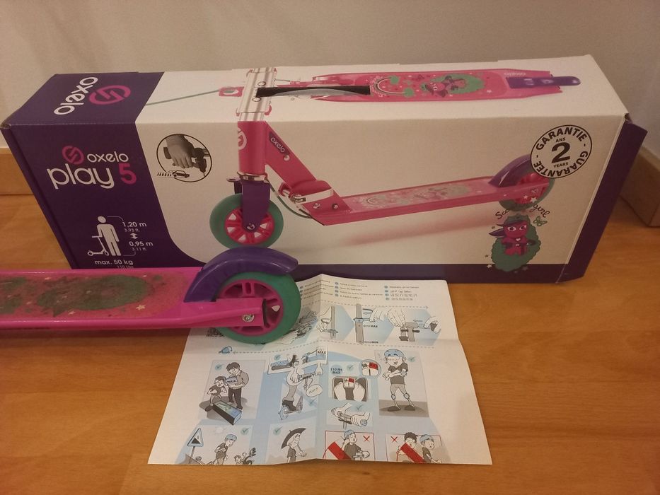 Trotinete rosa com travão mais caixa e manual