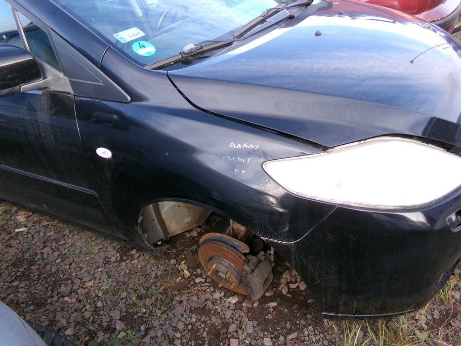 Lis55 Błotnik przedni prawy przód mazda 5 V 05r czarny wysyłka