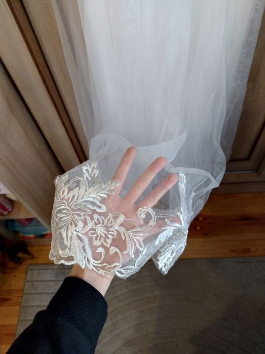 Suknia ślubna z trenem