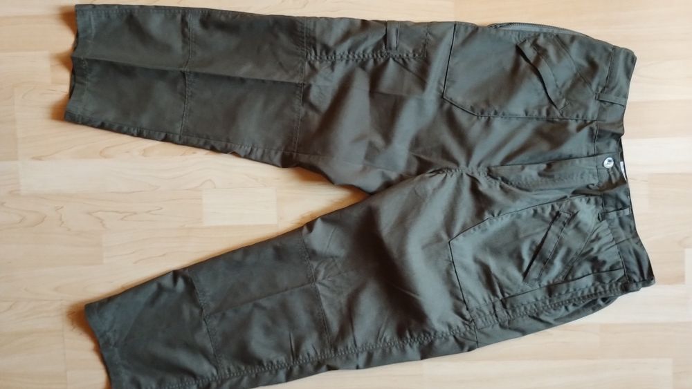 Spodnie trekkingowe Champion Wenlock® z wieloma kieszeniami są metki