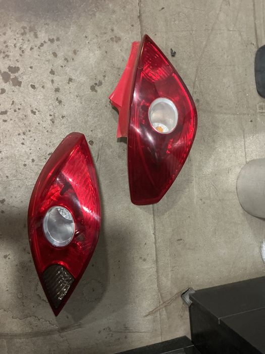 FAROLIM TRASEIRO DIREITO/ESQUERDO OPEL CORSA D ANO 2007