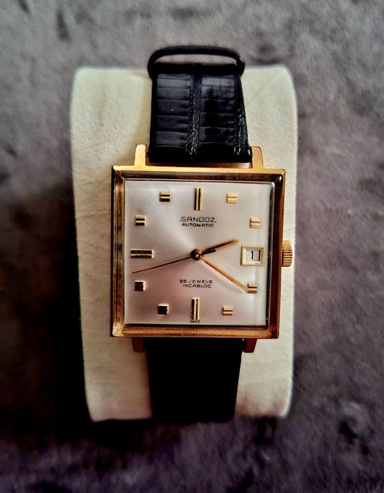 Sandoz szwajcarski złoty mechaniczny z naciągiem