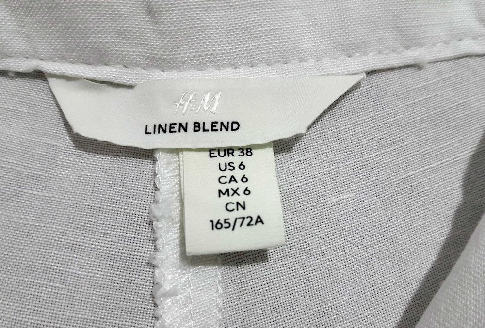 Calças brancas largas em linho da H&M T: 38