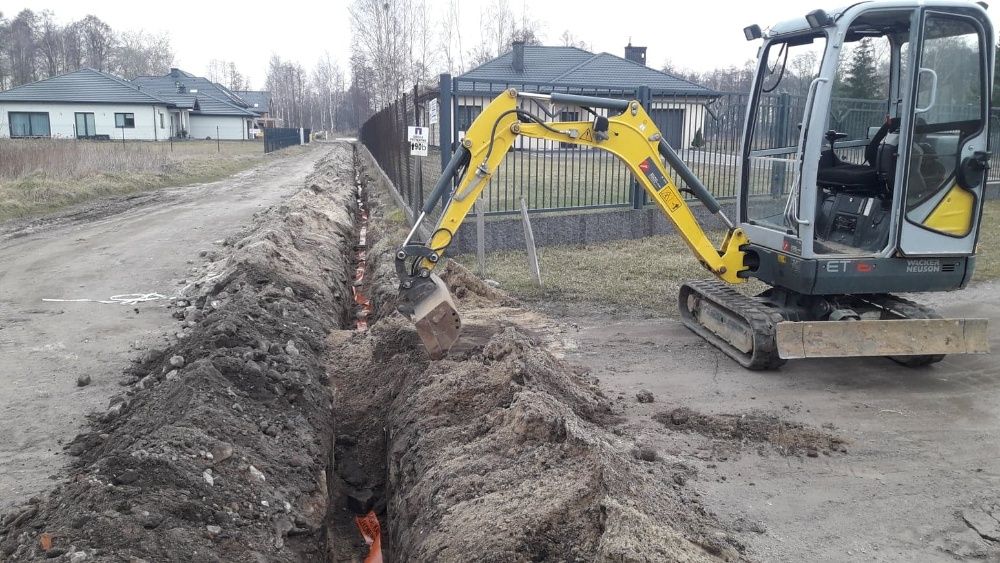 Usługi minikoparką oczyszczalnie szamba drenaże  rozbiórk  wiertnica
