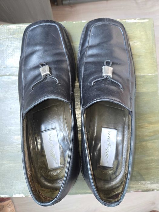 Sapatos de homem pretos