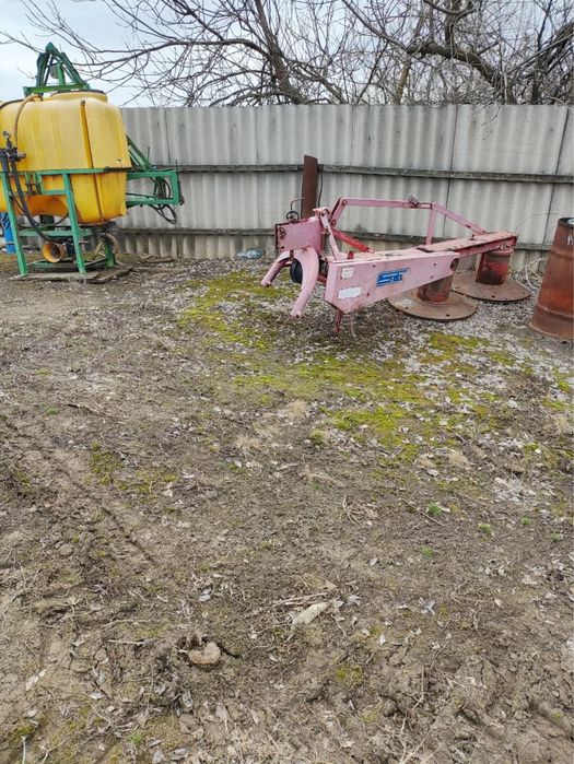 Косілка роторна, граблі ворошилки