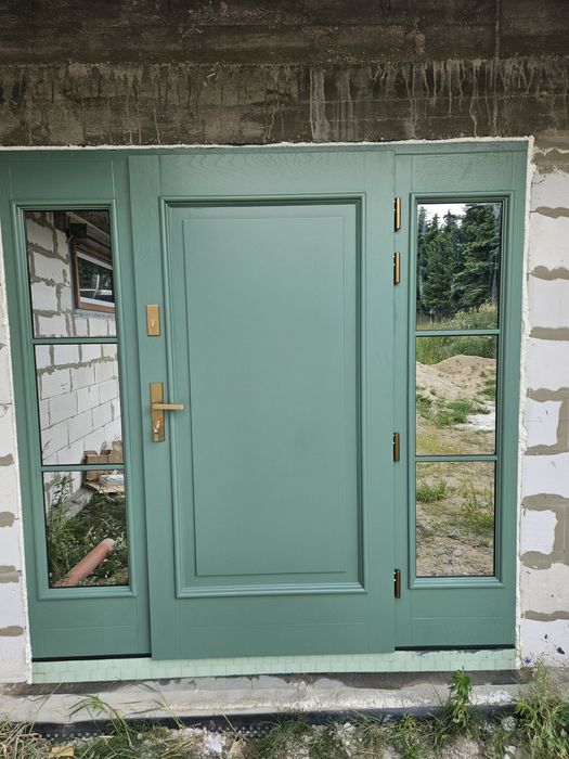 drzwi zewnętrzne drewniane producent oferujemy montaż i dowóz