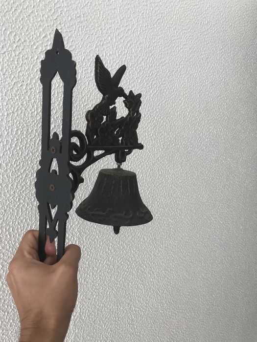 Sino em ferro pássaro