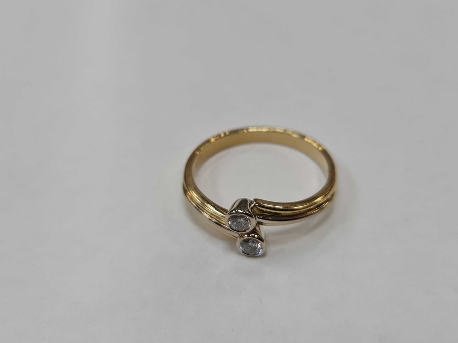 2x DIA/ Złoty pierścionek damski/ 750/ 3.36 gram/ R16/ 0.24 CT