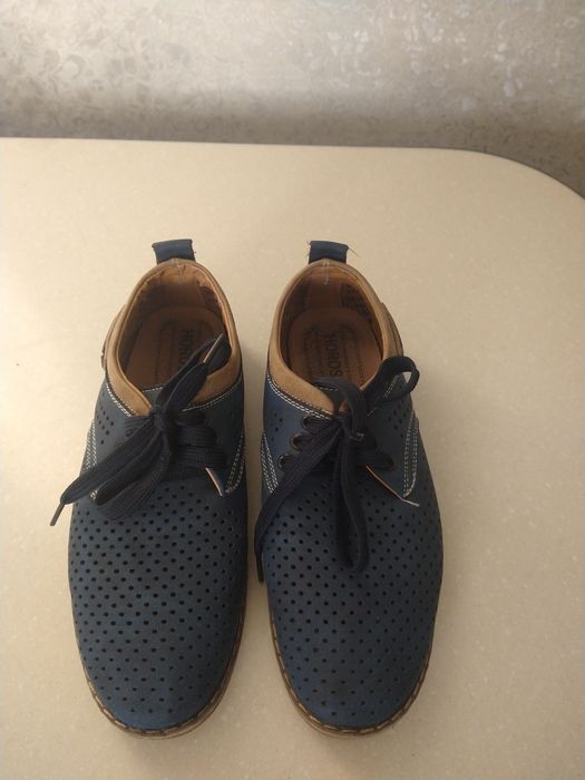 Туфлі з перфорацією