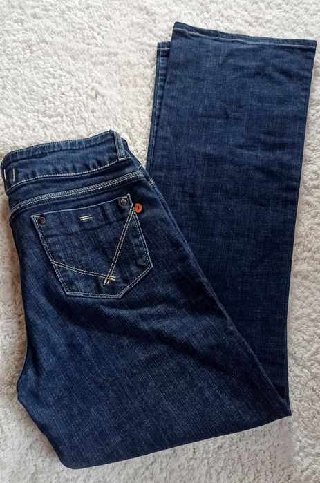 Spodnie damskie jeans poszerzane . Roz L
