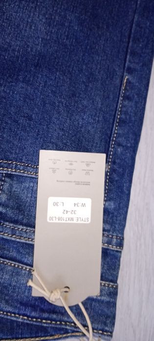 Nowe spodnie jeansy męskie