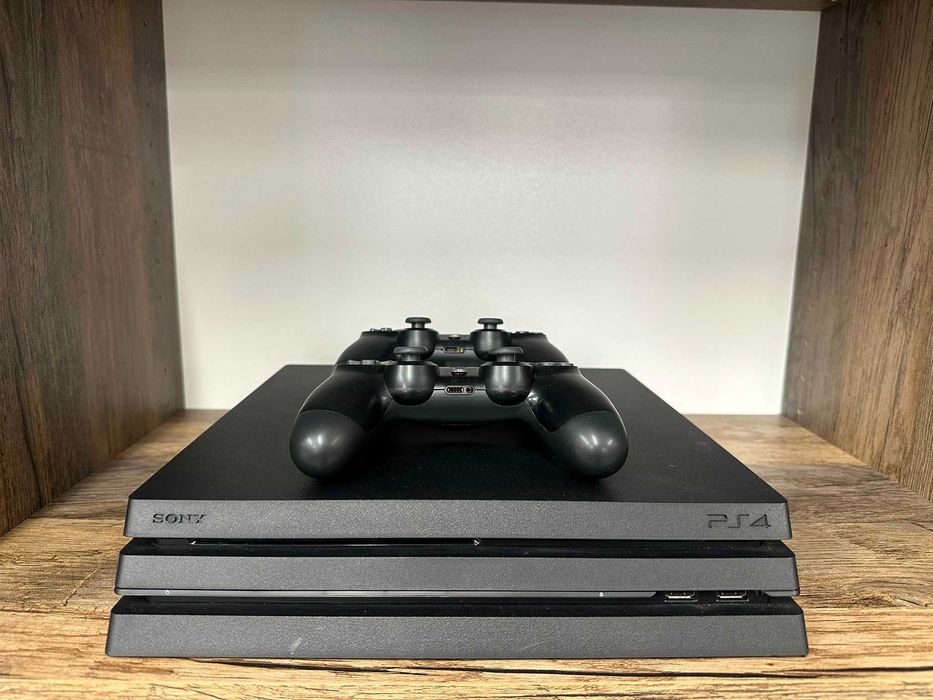Konsola Sony PS4 PlayStation4 Pro CUH-7016B 1TB HDD czarna + 2 pady stan bdb gwarancja