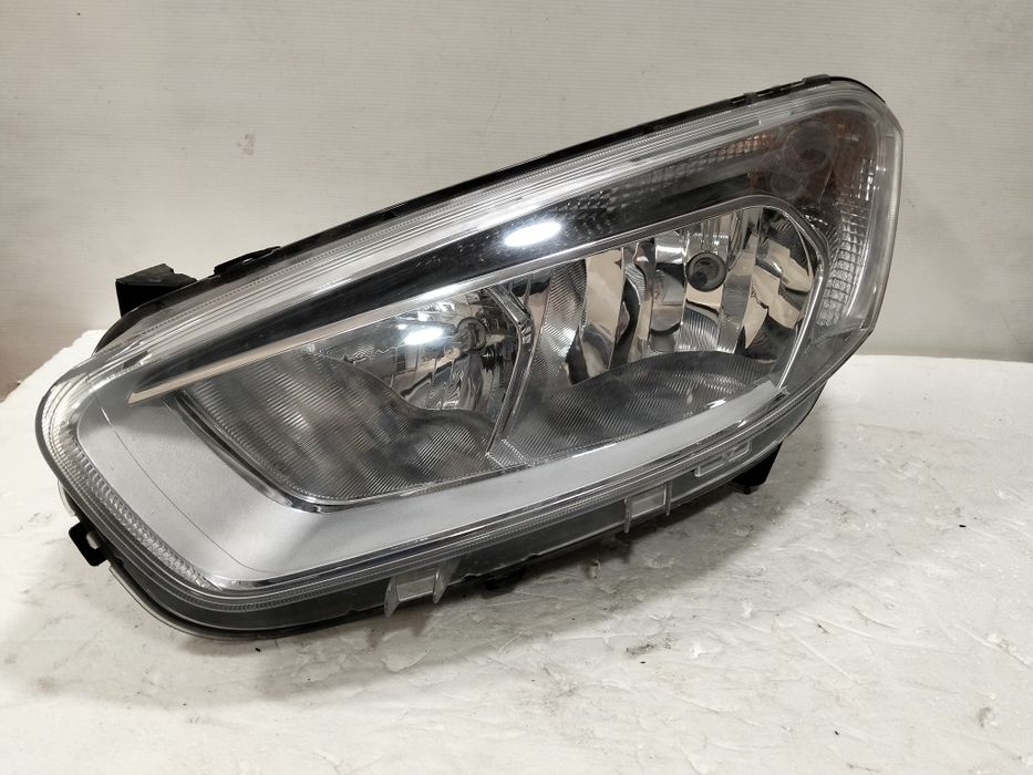 Farol Ford Transit Courier ótica 2015 esquerdo
