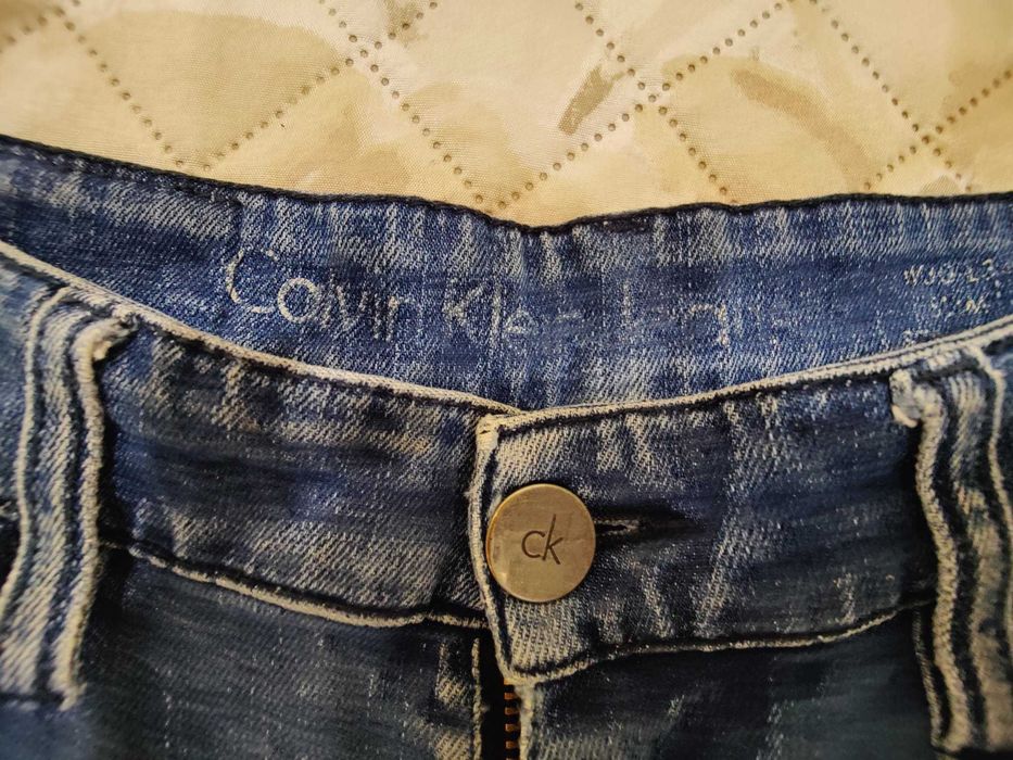 Calças Calvin Klein tam. 32 em excelente estado
