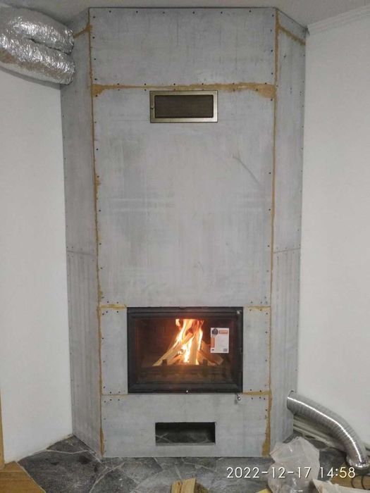 Якісний монтаж каміна з обігрівом на будинок