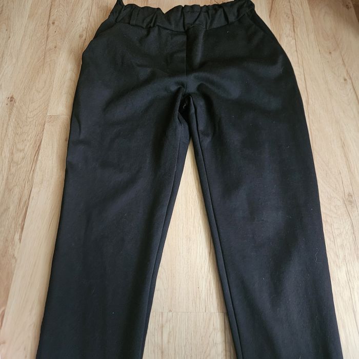 Spodnie czarne eleganckie,wysoki stan rozm.44. jak nowe.