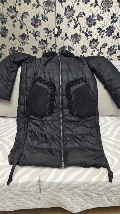 Продам пуховик большого размера.