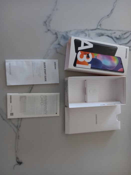 Caixa telemóvel Samsung A31 como nova